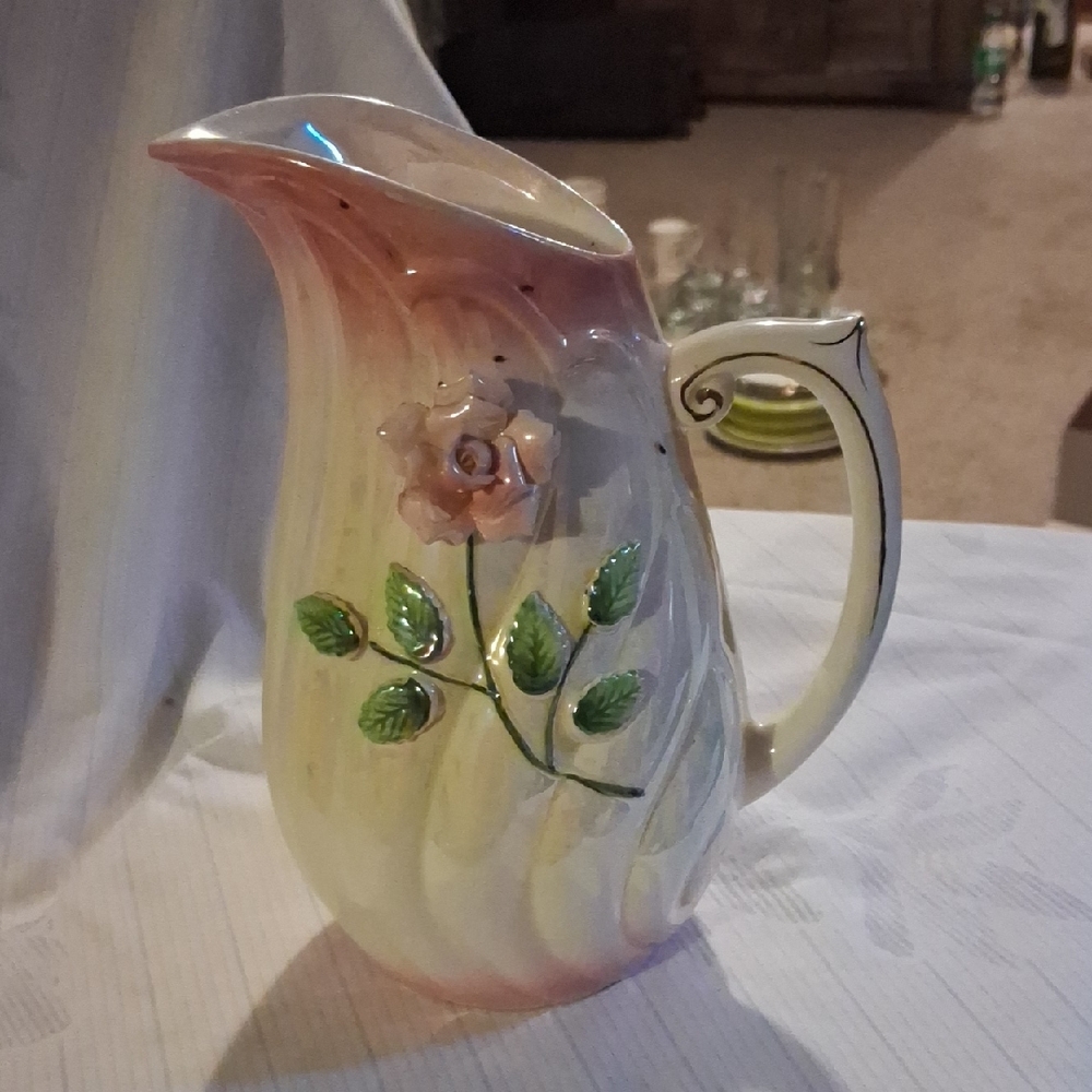 Porcelain pitcher with hand-painted floral relief by Norcrest